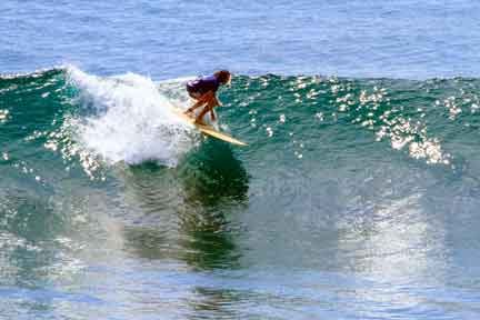 Intermediate-surfer-at-uluwatu-Next-Level-Surf-Camp-Bali.jpg