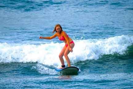 beginner-surfing-Padang-rights-NextLevel-Surfcamp-Bali.jpg